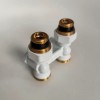 Узел нижнего подключения Giacomini R387X002, прямой 3/4 х 3/4, белый 9016