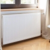 Панельный радиатор отопления PRIMOCLIMA Premium VC 11х500х2100 нижнее с вентилем, 2541 Вт