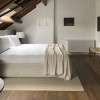 Трубчатый радиатор Rifar TUBOG 3062/25 B RAL 9016 белый глянцевый, боковое, ВхШхГ - 615х1150х107